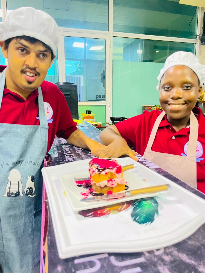 Students preparing dessert during cafe training