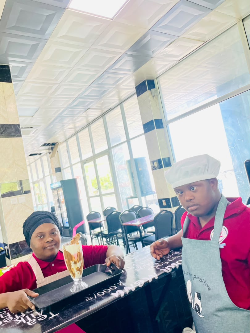 Students practising cafe service skills