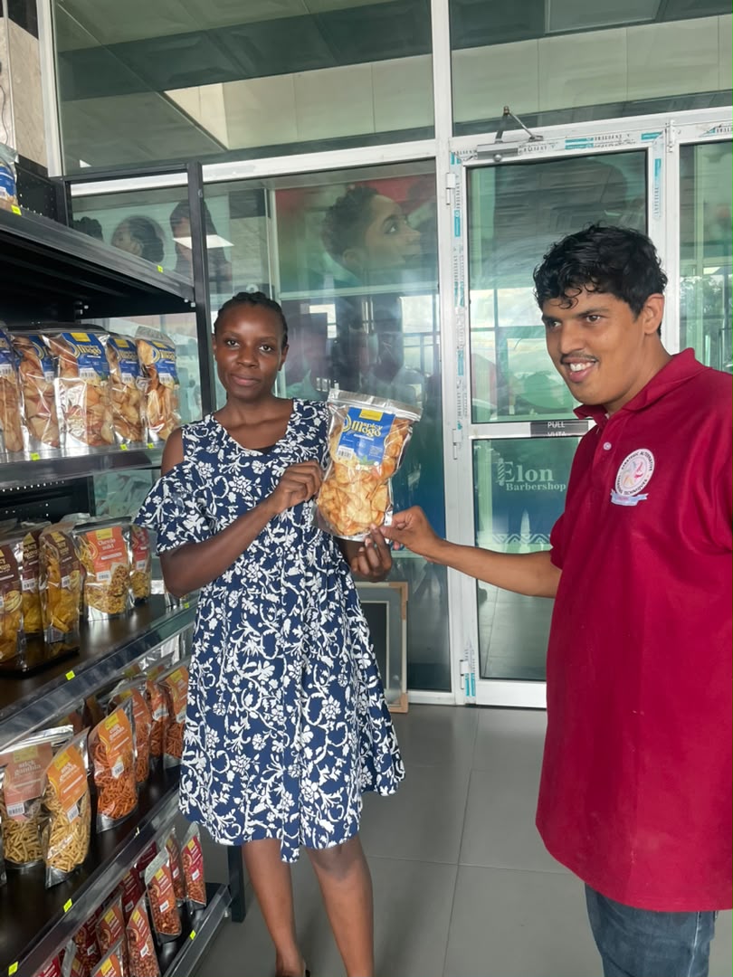 Student presenting a product in the supermarket