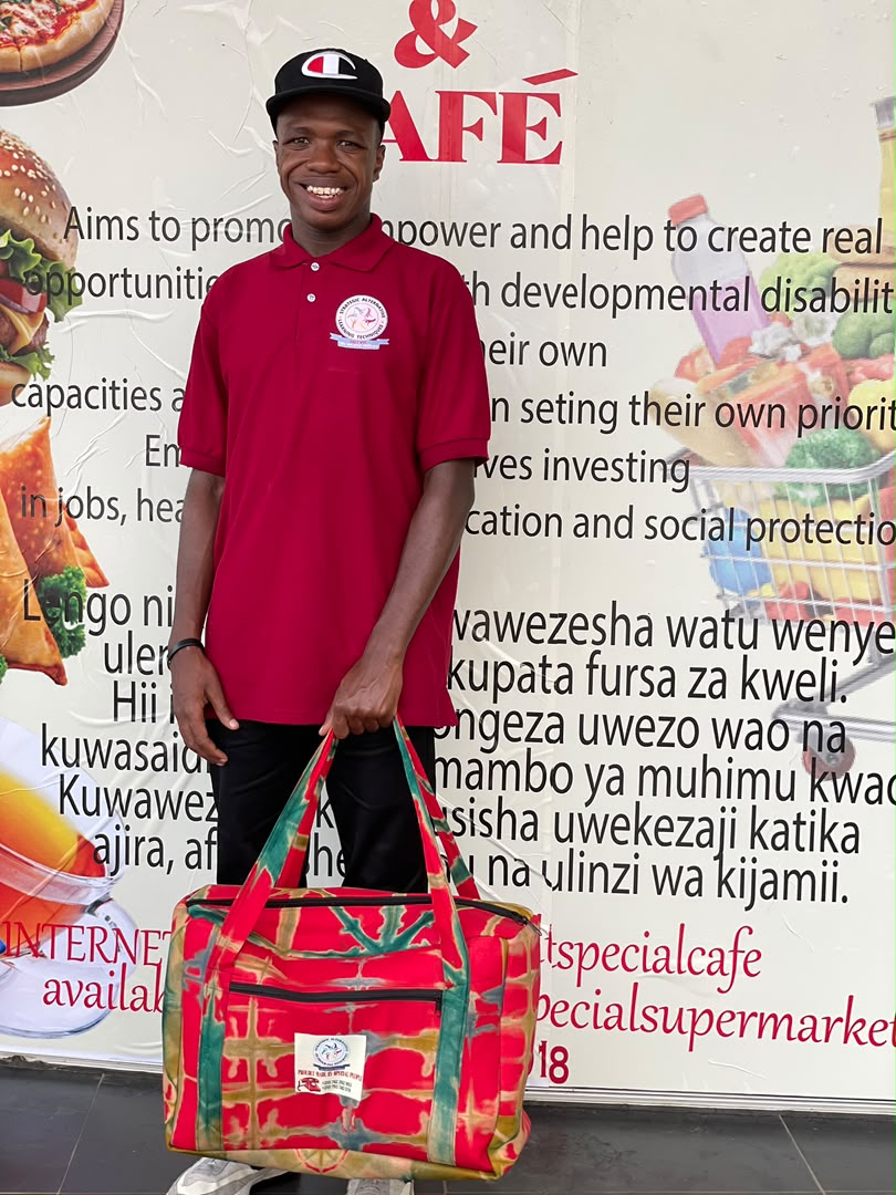 Student displaying a handmade SALT product